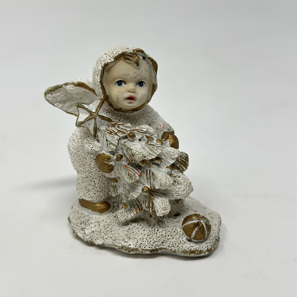 Snow Angel Figurine Carrying a Christmas Tree with a Gold Star